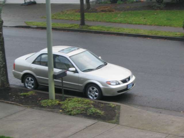It is a 2002 mazda protege.